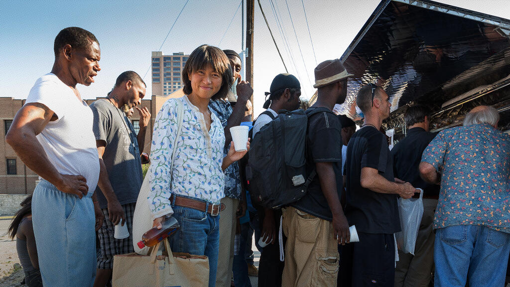 People gathering at a food truck