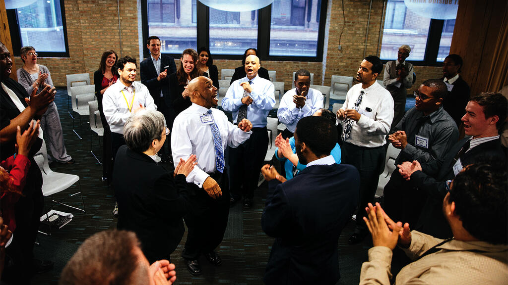 people celebrating at work