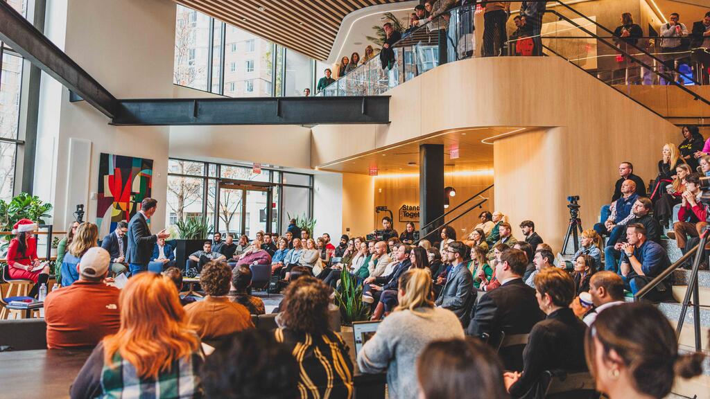 Crowd of staff members at Stand Together HQ
