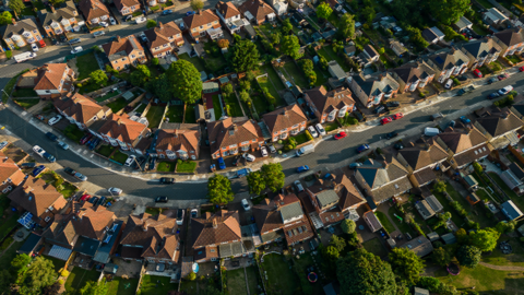 An aerial shot of houses in a suburban neighborhood