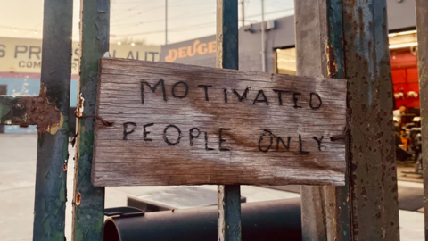 Sign that reads MOTIVATED PEOPLE ONLY