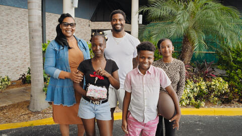 Jonathan Allen with a family.