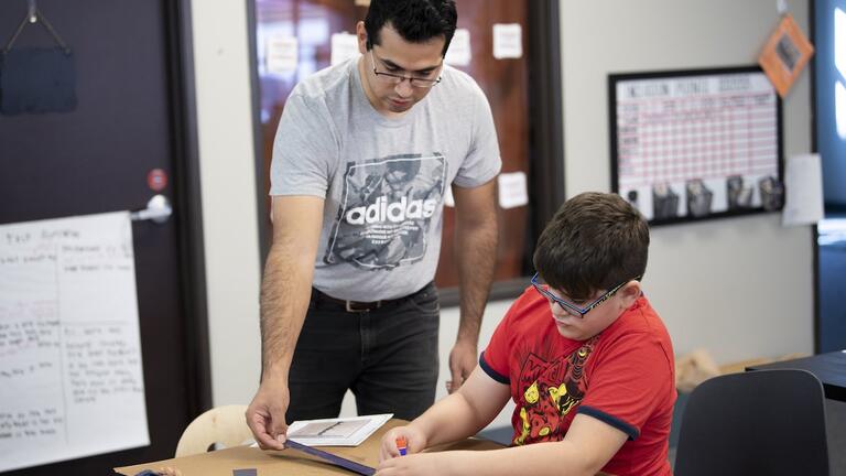 A teacher utilizing personalized education with a student