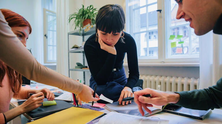 Employees working together in an office.