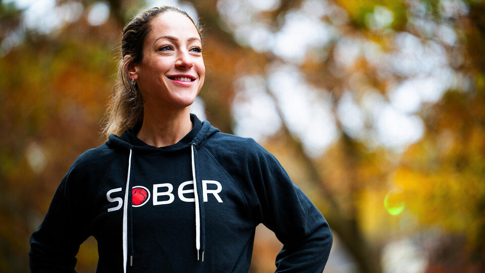 woman in a SOBER hoodie