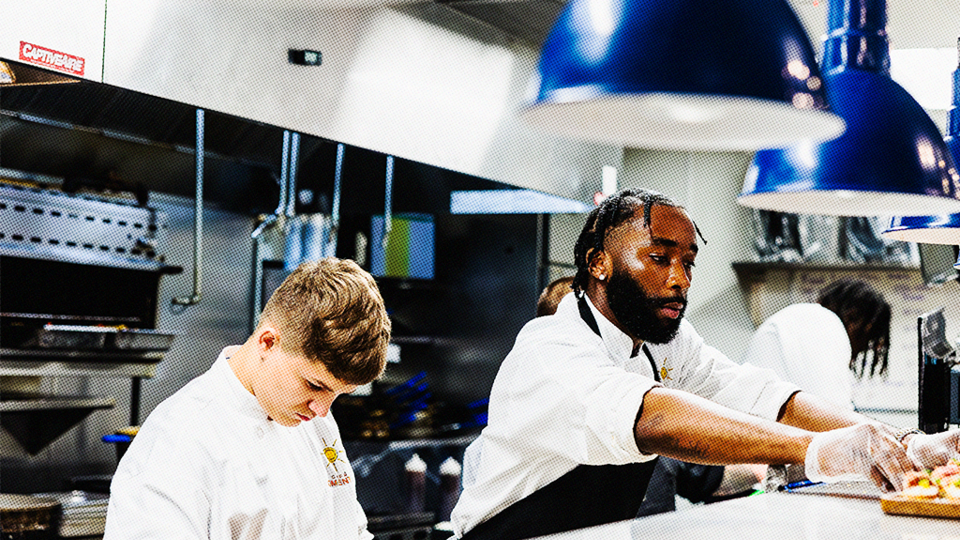 Young men in a commercial kitchen