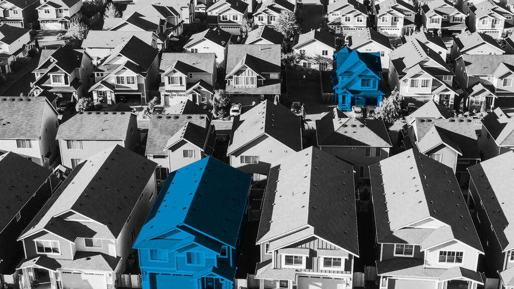 Ariel view of homes in a neighborhood.