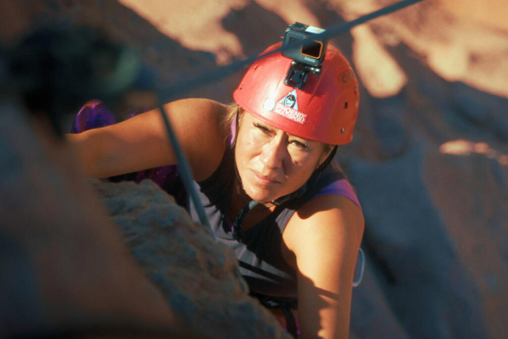 Raelynn Franklin ascends Lizard Rock in Moab, Utah.