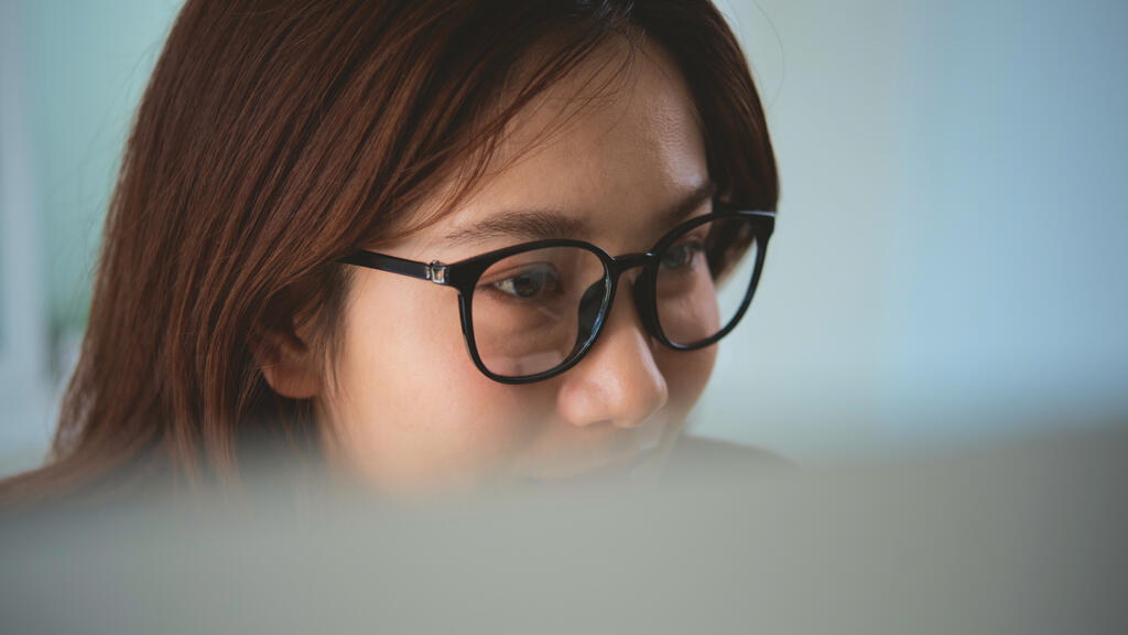 A woman with glasses.