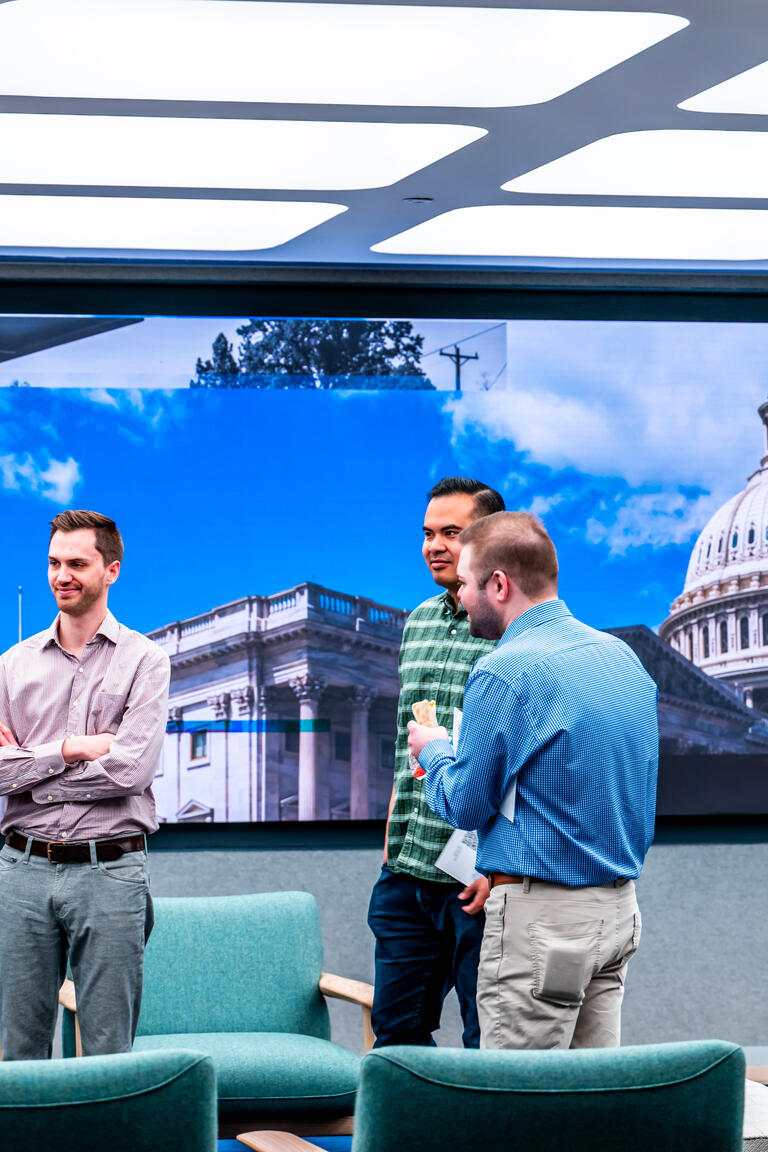 Group talking at Stand Together HQ